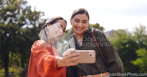 Image of friends and selfie in city with smile, peace sign and funny face with kiss, tongue and outdoor. Girl, women and street in metro for social media, photography or profile picture in park