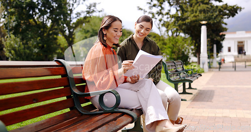 Image of Women, friends and laughing at park on bench, bonding and talking together. Girls, outdoor and happiness of people in conversation, comic discussion or comedy and enjoying quality time for friendship