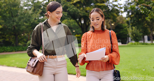 Image of Teamwork, documents and business women in park for planning, partnership and idea. Strategy, conversation and paperwork with female friends in city for professional, communication and collaboration