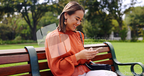 Image of Relax, phone and smile with woman on park bench for social media, streaming and news, Internet, technology and digital with business female in outdoors for communication, commute and networking