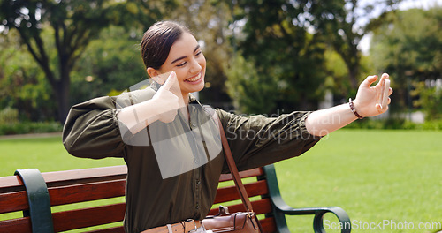 Image of Selfie, hand gesture and woman on bench at park taking pictures for social media influencer. Summer, profile picture and person sitting outdoor taking photo for happy memory, peace sign and thumbs up