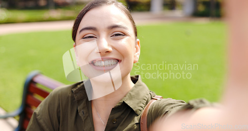 Image of Selfie, hand gesture and face of woman at park taking pictures for social media with happy influencer.profile picture and person sitting outdoor taking photo for happy memory.