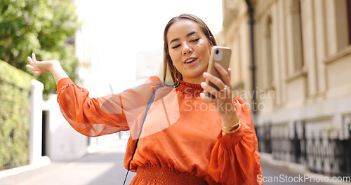 Image of Asian woman, phone and talking on video call in city, live streaming or vlogging. Influencer, cellphone and person on virtual chat in urban street, speaking or discussion outdoor for content creation