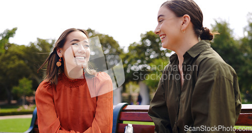 Image of Friends sitting outdoor, happy excited on phone. funny conversation comic discussion or comedy and enjoying quality time for friendship