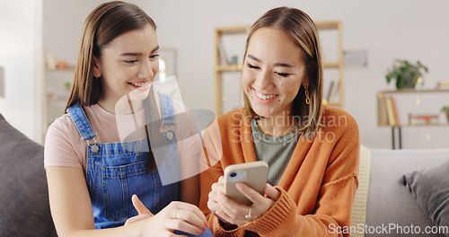Image of Relax, friends and women on couch, smartphone and search internet for videos, social media and resting. Females, happy people and girls with a cellphone, mobile app and online reading in living room