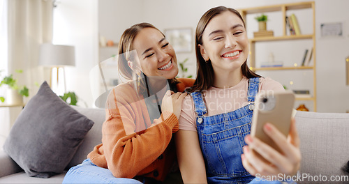 Image of Selfie, smile and women or friends on sofa for social media, influencer content creation or digital memory and emoji face. Young, gen z people in profile picture, online photography and relax at home