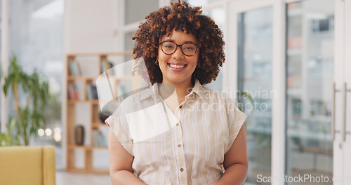 Image of Happy, smile and face of a woman in the office with a positive, good and confidence mindset. Happiness, excited and portrait of a professional female employee from Mexico standing in modern workplace