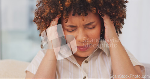 Image of Laptop, headache and woman with pain on sofa in living room, feeling sick or tired. Mental health, anxiety and female remote worker with depression, burnout or stress, fatigue or migraine in home.