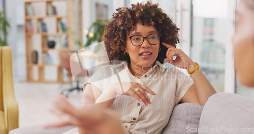 Image of Happy, relax and women on the living room couch for advice, communication and catching up conversation at home. Talking, bonding and friends sharing a story, secret or gossip on the sofa together.