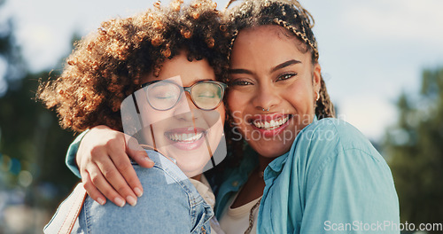 Image of Friends, sisters and portrait of black women hugging outside with smile, happiness and solidarity in love and pride. Lesbian couple, woman and friend in happy embrace for support and trust together.