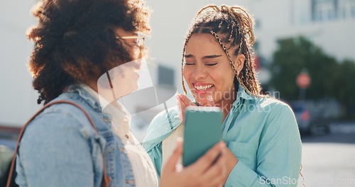 Image of 5g technology, cellphone and smile of happy girls with mobile for comic meme, comedy or joke on internet. Friends, women laughing and phone in city for social media, funny message or online humor.
