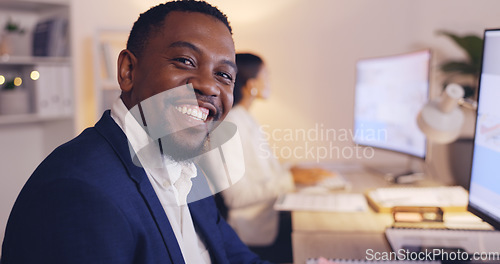 Image of Business, night and face of happy black man in office working late on computer for planning, goals and project. Corporate, manager and portrait of male entrepreneur with confidence, pride and smile
