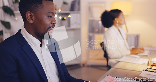 Image of Business, writing and black man with notebook by computer working late for planning, proposal and project. Corporate, focus and male worker at desk schedule, website research and online report notes