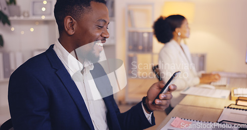Image of Night, computer and phone call with black man in office for consulting, networking and communication. Discussion, connection and hello with male in agency for commitment, positive and overtime