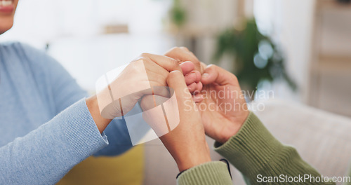 Image of Couple, people and holding hands for support, love and care of trust together in romantic relationship. Closeup of man, woman and helping hand of life partner, loyalty and commitment of hope at home