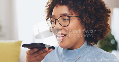 Image of Voice call, phone and woman on sofa talking, communication or networking on mobile app or voip. Young biracial person speaking on smartphone, recording audio or online translation service at her home