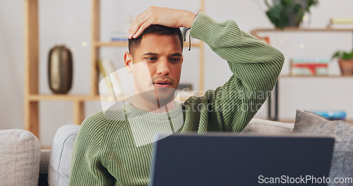 Image of Stress, fail and laptop of man on sofa reading news, results or feedback on application problem, rejection or feedback. Anxiety, frustrated and person at home with computer error, mistake or email