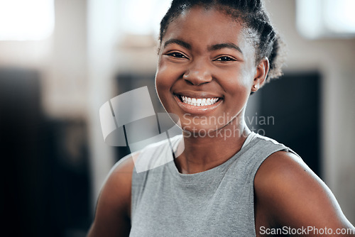 Image of Smile, portrait or happy black woman at gym for a workout, exercise or training for healthy fitness or wellness. Face of sports girl or proud African athlete smiling or relaxing with positive mindset