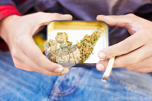 Image of Marijuana, bud or hands with weed joint for calm peace to relax or help reduce pain, stress or anxiety. Cannabis head plants, smoking or closeup of person showing a blunt for mental health benefits