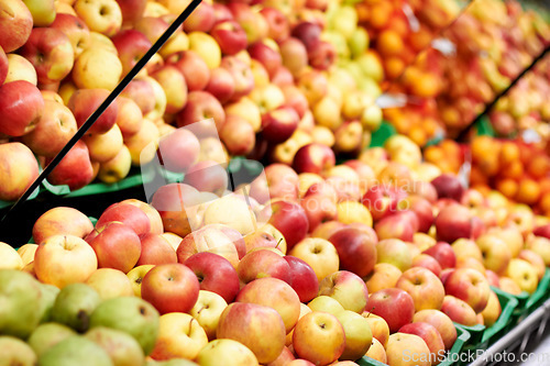 Image of Health, supermarket and closeup of red apples for nutrition, wellness or organic raw diet. Food, shop and zoom of healthy, natural and fresh fruit in baskets at retail farmers market or grocery store