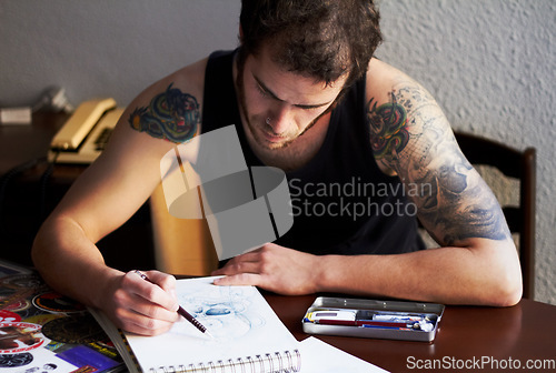 Image of Art, notebook or man drawing picture, unique creative sketch or cartoon character design. Talent, illustration designer or male artist inspiration for comic, ink tattoo or artwork development process