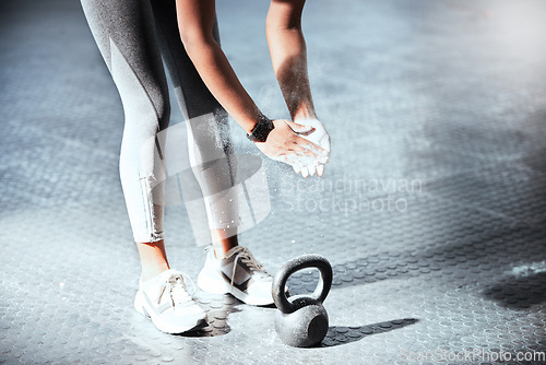 Image of Fitness, kettlebell or hands of person with chalk to start training, workout or exercise for grip strength. Body builder, gym floor or healthy athlete with dust powder ready for lifting weights