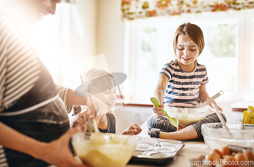 Image of Mother, playing or happy kids baking in kitchen as a happy family with playful young siblings with flour. Dirty, messy or funny mom helping, cooking or teaching girls to bake for learning at home