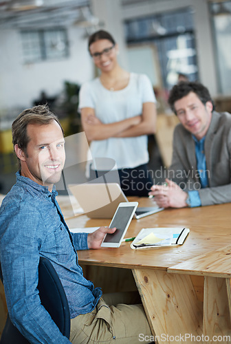 Image of Teamwork, portrait or happy web designers in meeting for discussion or brainstorming together in office. Diversity, digital or developers networking with technology, tablet or laptop in workplace