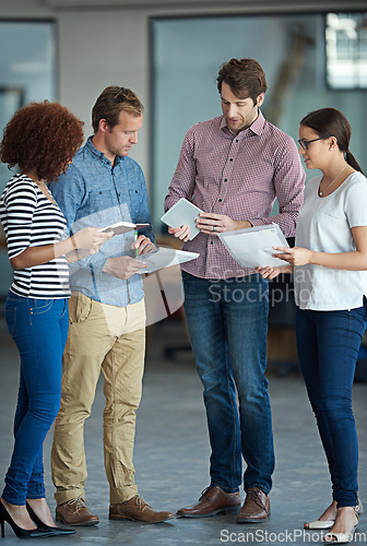 Image of Team planning, startup or business people with ideas in meeting for brainstorming together in office. Diversity, digital or IT employees networking with technology, notes or documents in workplace