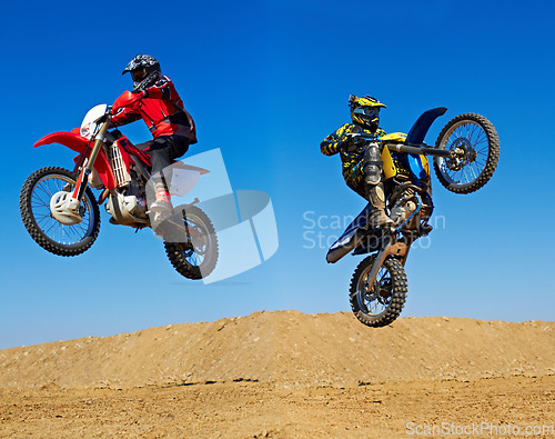 Image of Motorcycle jump, sport and action with stunt and energy on off road track, transportation and people race outdoor. Competition, dirt bike and performance with adrenaline, exercise and challenge