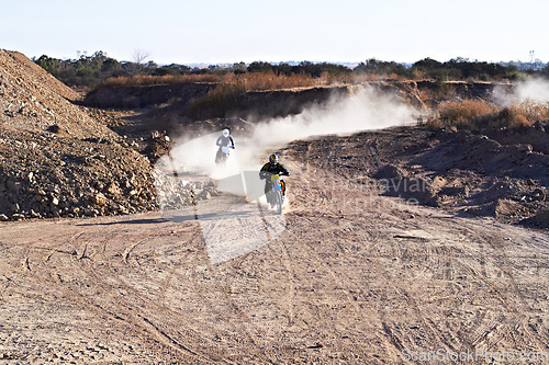 Image of People in race, motorcycle and sport with speed, action and energy on off road track, transportation and outdoor. Competition, dirt bike and performance with fast biker, exercise and challenge