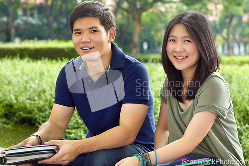 Image of Students, education and portrait of friends in college for learning, scholarship or knowledge. University, study and future with Asian man and woman on campus for back to school, motivation and youth