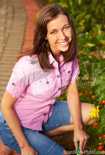 Image of Woman in garden, smile in portrait and gardening, nature and plant with environment, growth and flowers. Botany, Spring blossom and happy female gardener outdoor, planting and landscaping in backyard