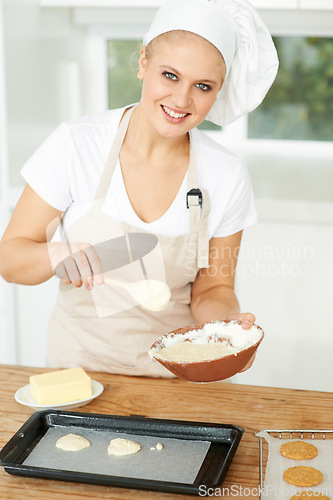 Image of Happy woman, portrait or chef baking cookies with dough or pastry in a bakery kitchen with recipe. Food business, dessert tray or girl baker working in preparation of a sweet meal, cake or biscuit