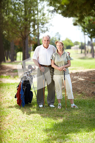 Image of Happy old couple, portrait or golfers on course in fitness workout, exercise or round together on field. Embrace, healthy elderly man relaxing or smiling in golfing sports game with senior woman