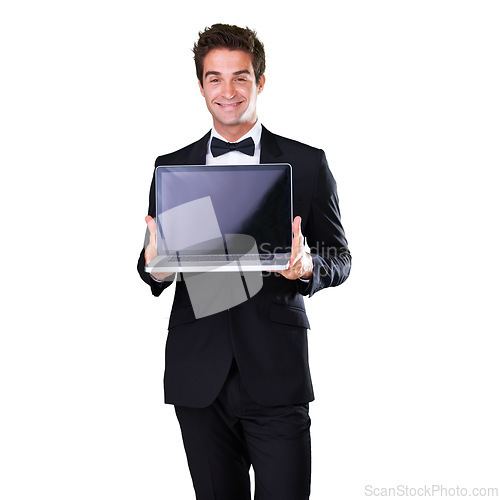 Image of Portrait, happy and male waiter with blank screen for service in studio and white background with luxury. Butler, man and smile and menu on laptop with servant on website in mockup space with tuxedo.