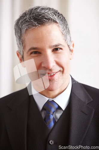 Image of Happy, mature businessman and portrait at work for a corporate job or management salesman. Smile, suit and a headshot of an expert executive manager, ceo or advisor of a sales company in an office