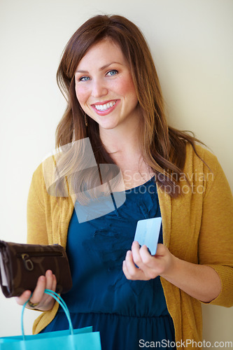 Image of Happy, retail portrait and a woman after shopping, weekend sale and shop discount. Smile, confident and a young person with a bag from a store after a boutique deal or making a purchase on a wall