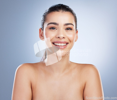 Image of Skincare, beauty and portrait of a woman in studio for a natural, wellness or health face routine. Dermatology, self care and young female model with glow facial treatment isolated by gray background