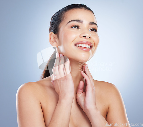 Image of Smile, skincare and hands on face of woman in studio for wellness, glowing skin or cosmetic satisfaction on grey background. Beauty, soft and asian lady model happy with dermatology, luxury or result