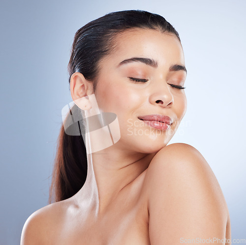 Image of Makeup, body care and asian woman in studio with glowing skin, treatment or satisfaction on grey background. Self love, wellness and female model relax with natural cosmetics, smile or beauty results