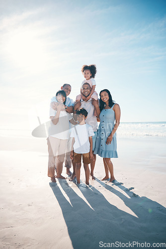 Image of Vacation, beach and portrait of happy family together at the sea or ocean bonding for love, care and happiness. Happy, sun and parents with children or kids and grandparents on a holiday for freedom