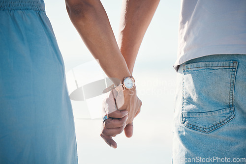 Image of Couple, holding hands and love outdoor with trust, comfort and hope, empathy and kindness. Together, support and man with woman for family, solidarity and bond, loyalty and marriage commitment