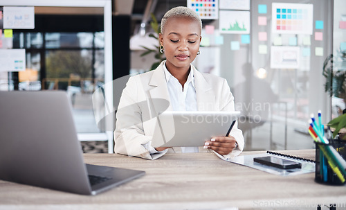 Image of Laptop, business and black woman in office on tablet for research, website and browse internet. Corporate, connection and female person on digital tech working on online project, report and review