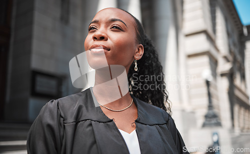 Image of Court, woman judge or lawyer outside, thinking and professional career in legal justice system. Pride, confidence and attorney with ideas, motivation and advocate on street at law firm in Africa.