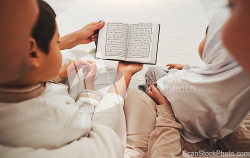 Image of Quran, Muslim children and parents reading, learning and help kids with religion prayer, Islamic study and faith in Allah. Spiritual book, home or people teaching, support and youth child pray to God