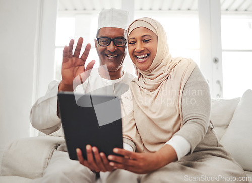 Image of Tablet video call, Islamic and elderly couple smile, wave hello and speaking on online communication, chat or talk. Contact, Muslim home and senior man, woman and people happy on virtual conversation