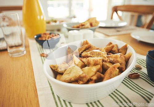 Image of Food, Eid Mubarak and samosa for family at table for Islamic celebration, festival and lunch together. Ramadan, religion and closeup of meal, dish and cuisine for fasting end, holiday and culture