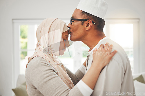 Image of Home, Muslim elderly couple and forehead kiss, music slow dancing and bond for love, trust and care with kindness. Commitment, Islamic and Arab man, woman and senior people together for quality time