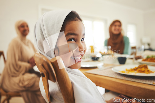 Image of Food, muslim and child with big family at table for eid mubarak, Islamic celebration and lunch. Ramadan festival, culture and iftar with people eating at home for fasting, islam and religion holiday